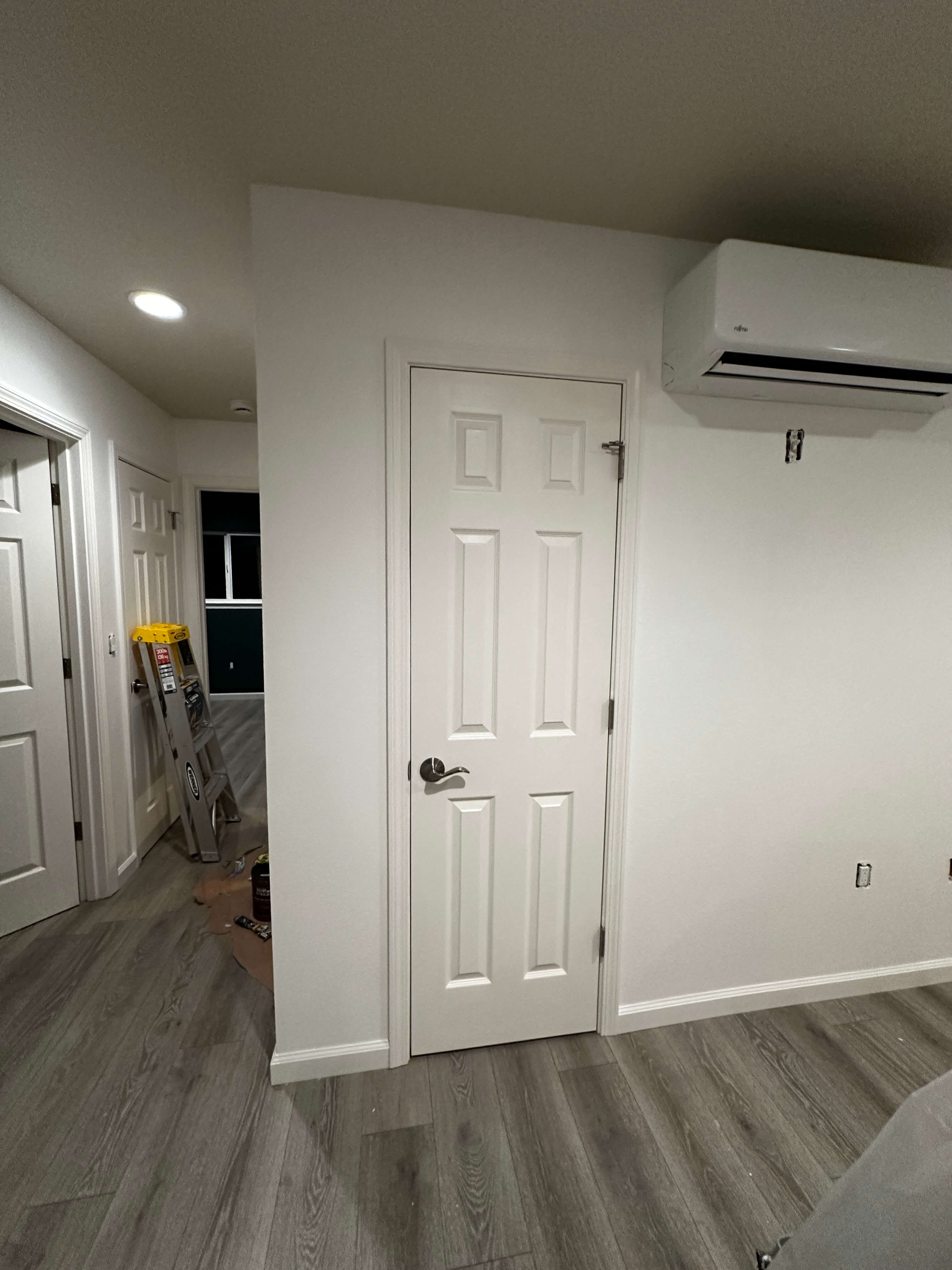 Renovated room with fresh white paint